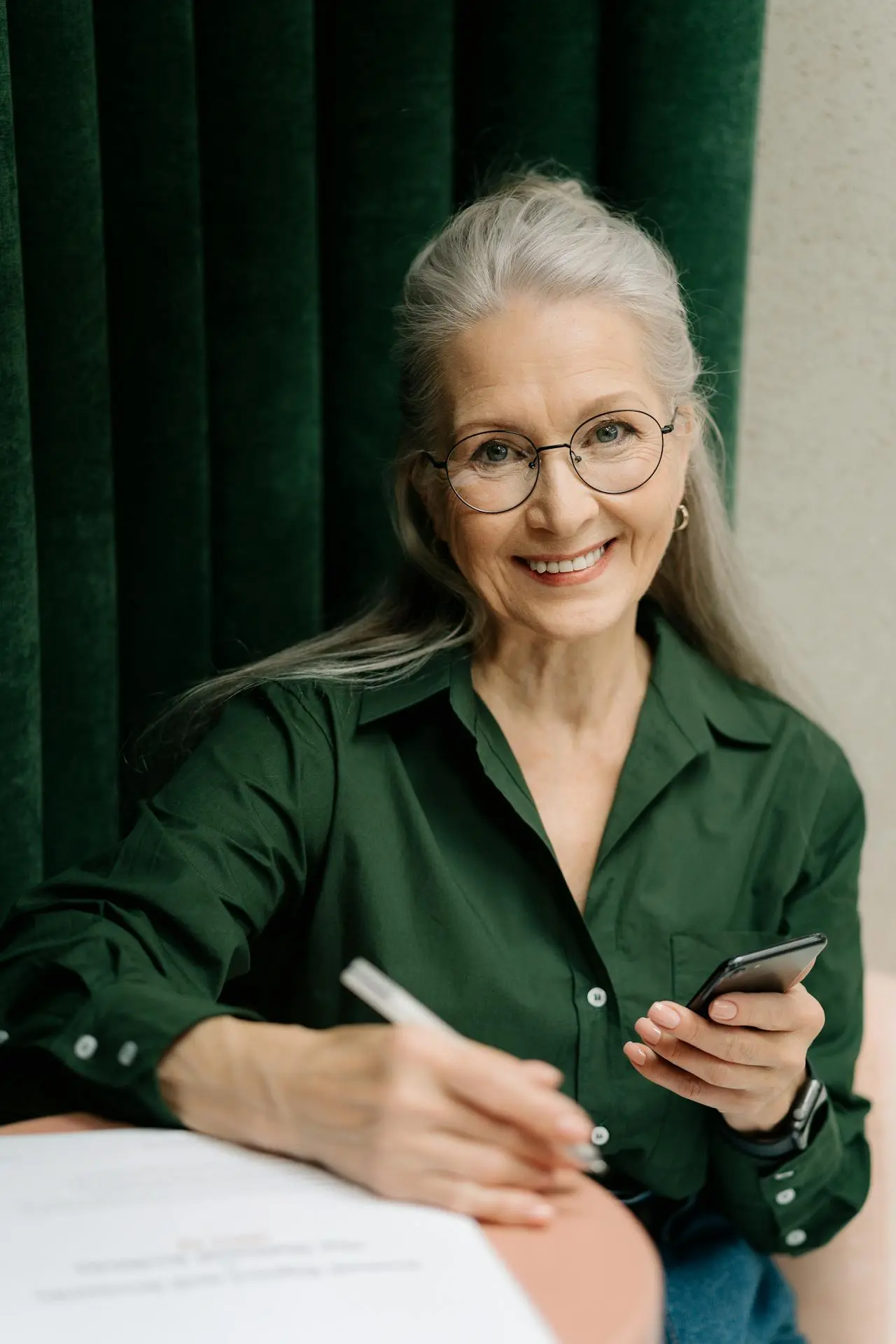 female business owner reviewing secured loan documents