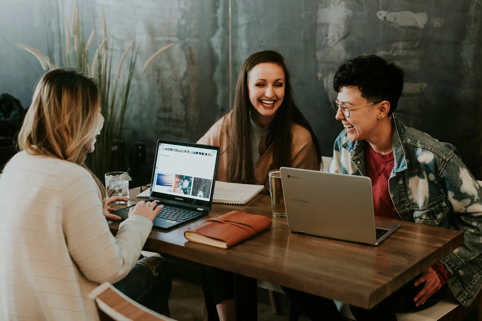 women business owners researching small business loans online